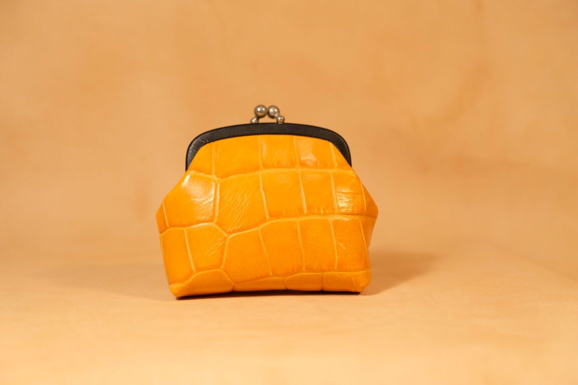 monedero circular vintage piel coco naranja