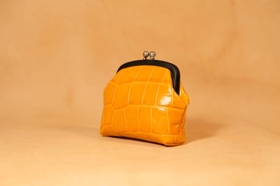 monedero circular vintage piel coco naranja