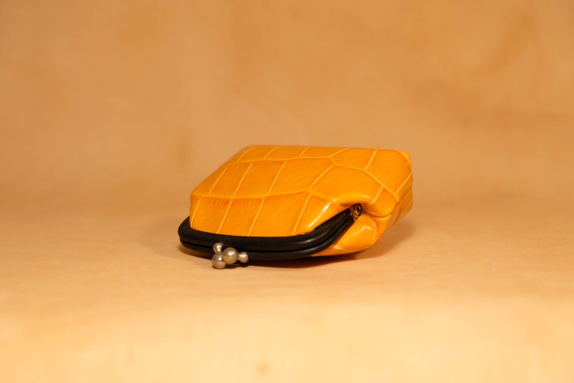monedero circular vintage piel coco naranja