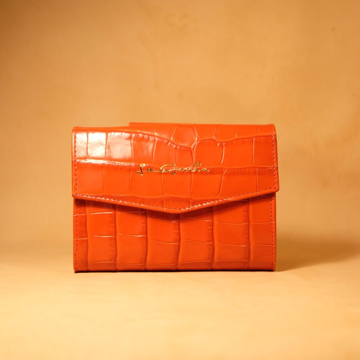 Cartera de piel para mujer con efecto coco naranja con adorno