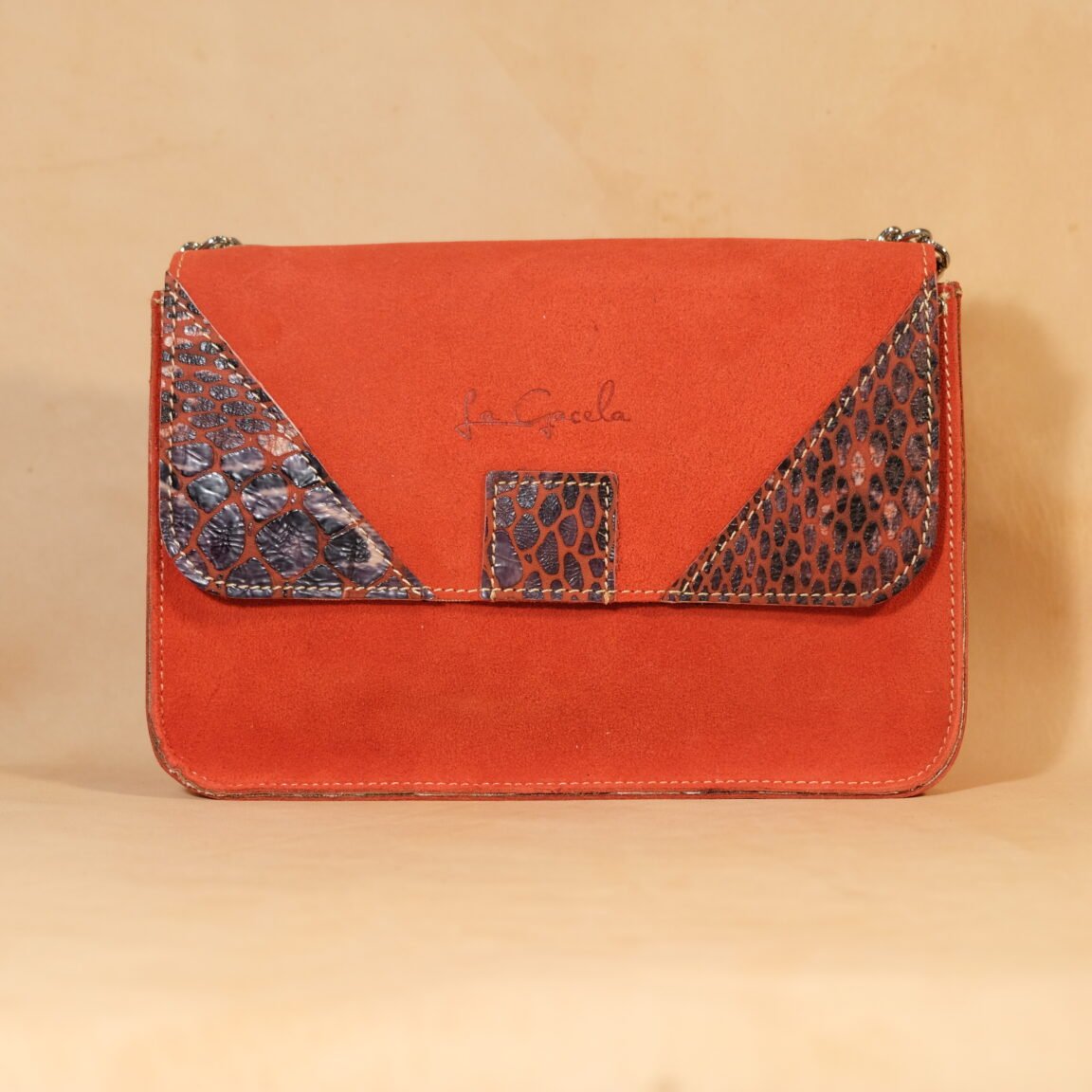 bolso piel roja interior cebra