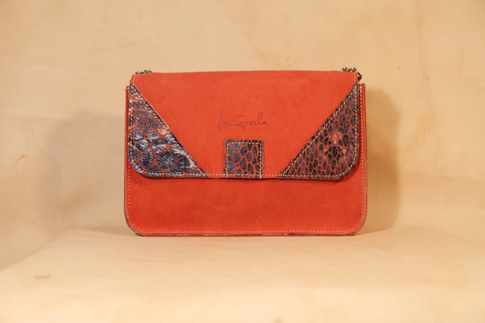 bolso piel roja interior cebra